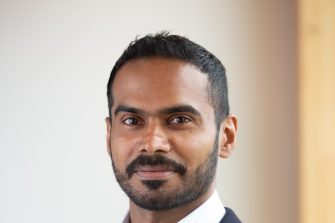 A headshot photo of Aswin Ratheesh