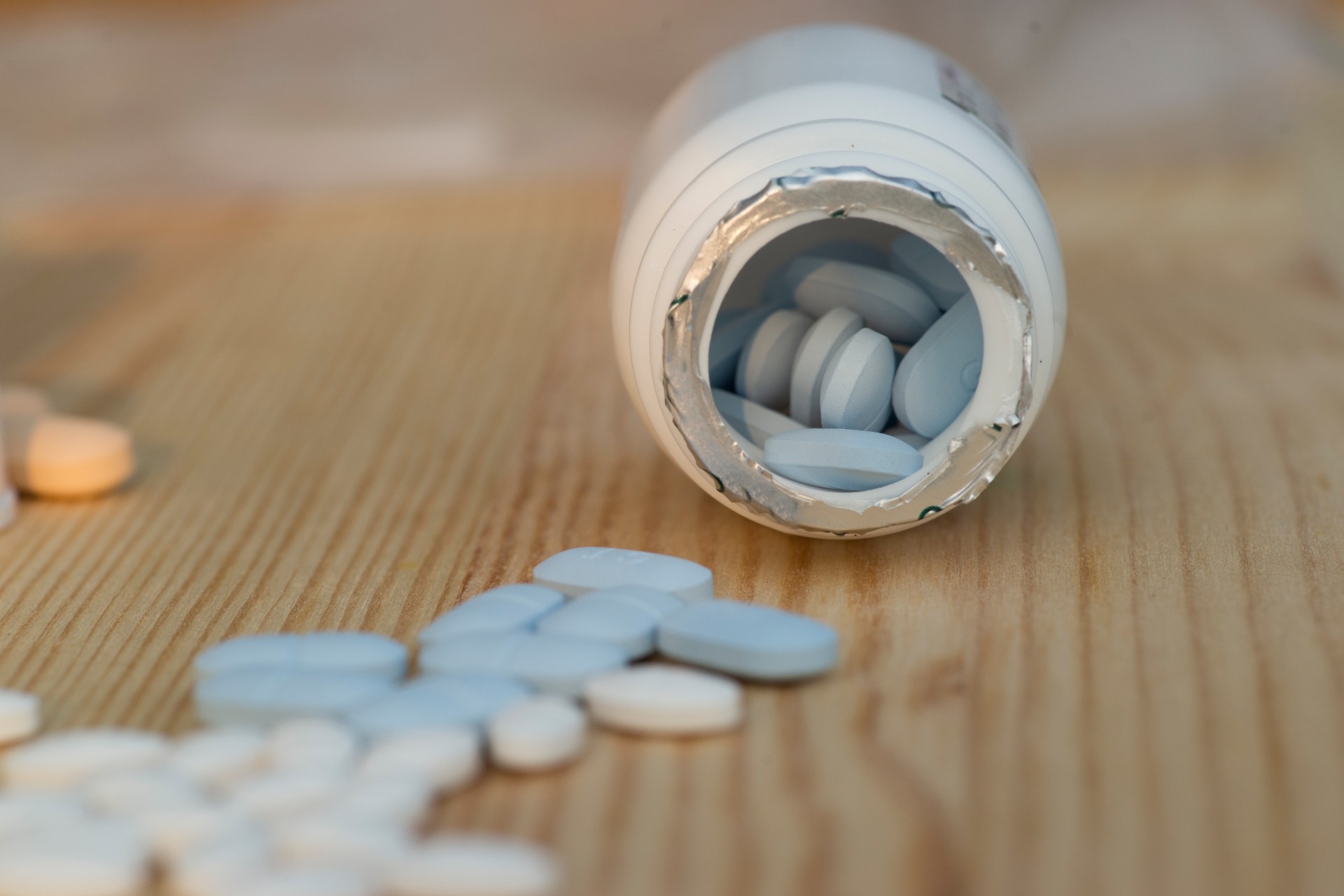 Antiretrovirals on wooden background