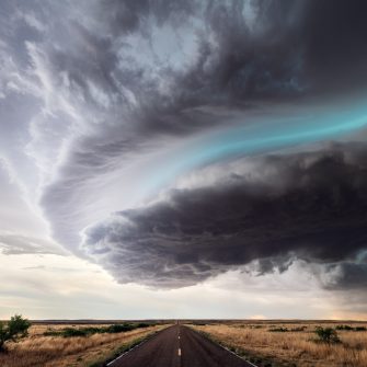storm clouds over a road