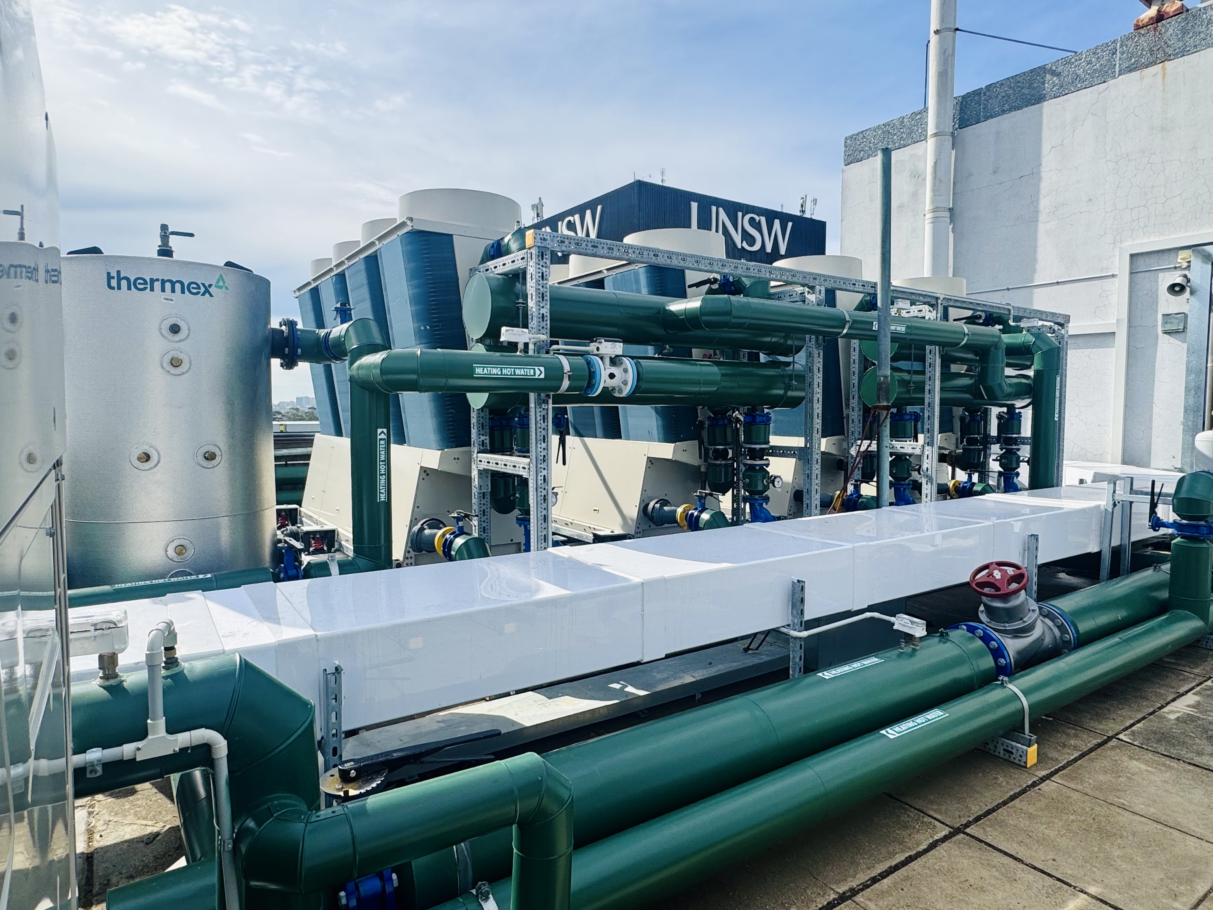 A heat pump facility at UNSW Kensington Campus. UNSW Library sign in the background.