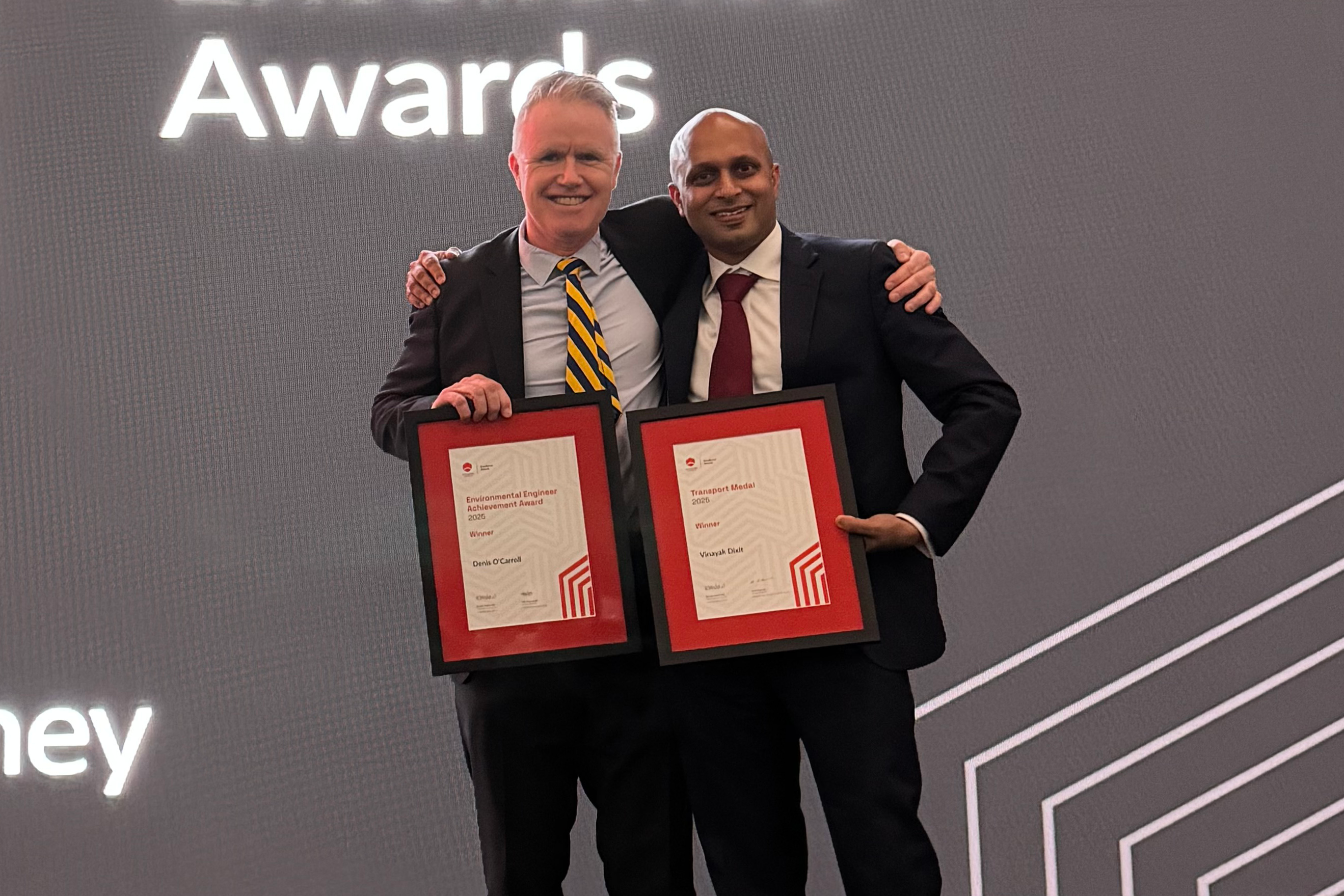 Professor Denis O'Carroll and Professor Vinayak Dixit on stage at the Engineers Australia Awards