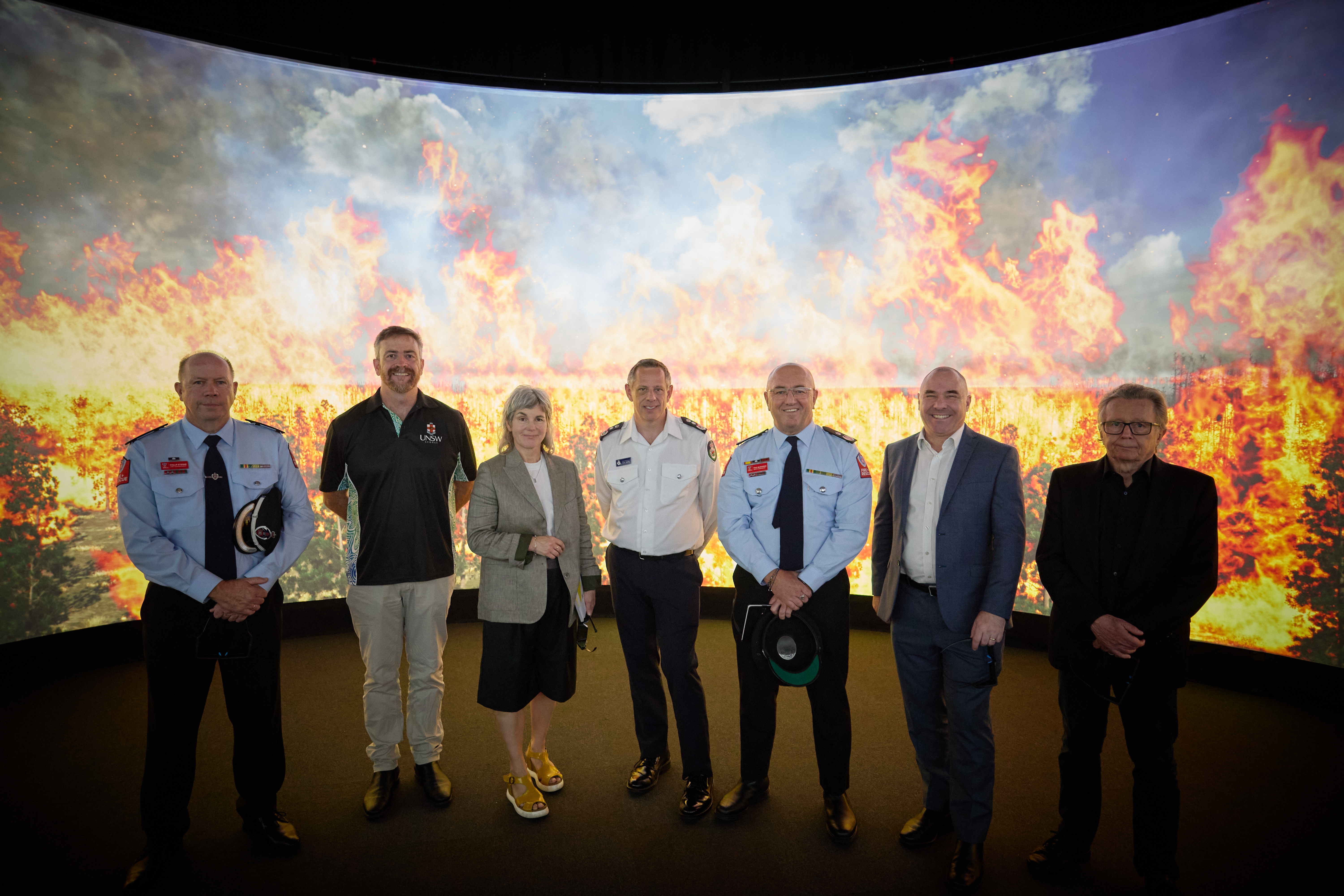 A/Assistant Commissioner Education and Training FRNSW Phillip Etienne AFSM, UNSW Vice-Chancellor & President Professor Attila Brungs, Dean of UNSW Arts, Design & Architecture Professor Claire Annesley, Commissioner of the NSW Rural Fire Service Trent Curtin, Deputy Commissioner – Strategic Capability FRNSW Paul McGuiggan, Dean of UNSW Engineering Professor Julien Epps and Director of the iCinema Centre UNSW Scientia Professor Dennis Del Favero at an iFire demonstration