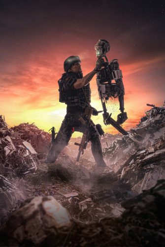 Robotic War ( men vs machines ) - Illustration of an apocalyptic scene of a soldier holding a robot in war.