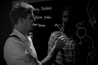 Quantum scientists working with a cat