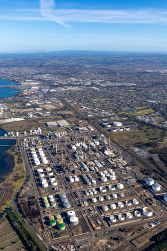Aerial view of Geelong Energy Hub, oil refinery and LNG gas terminal in Corio Bay, Victoria Australia