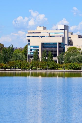 High Court of Australia building as seen from the opposite shore of Lake Burley Griffin in Canberra, Australian Capital Territory