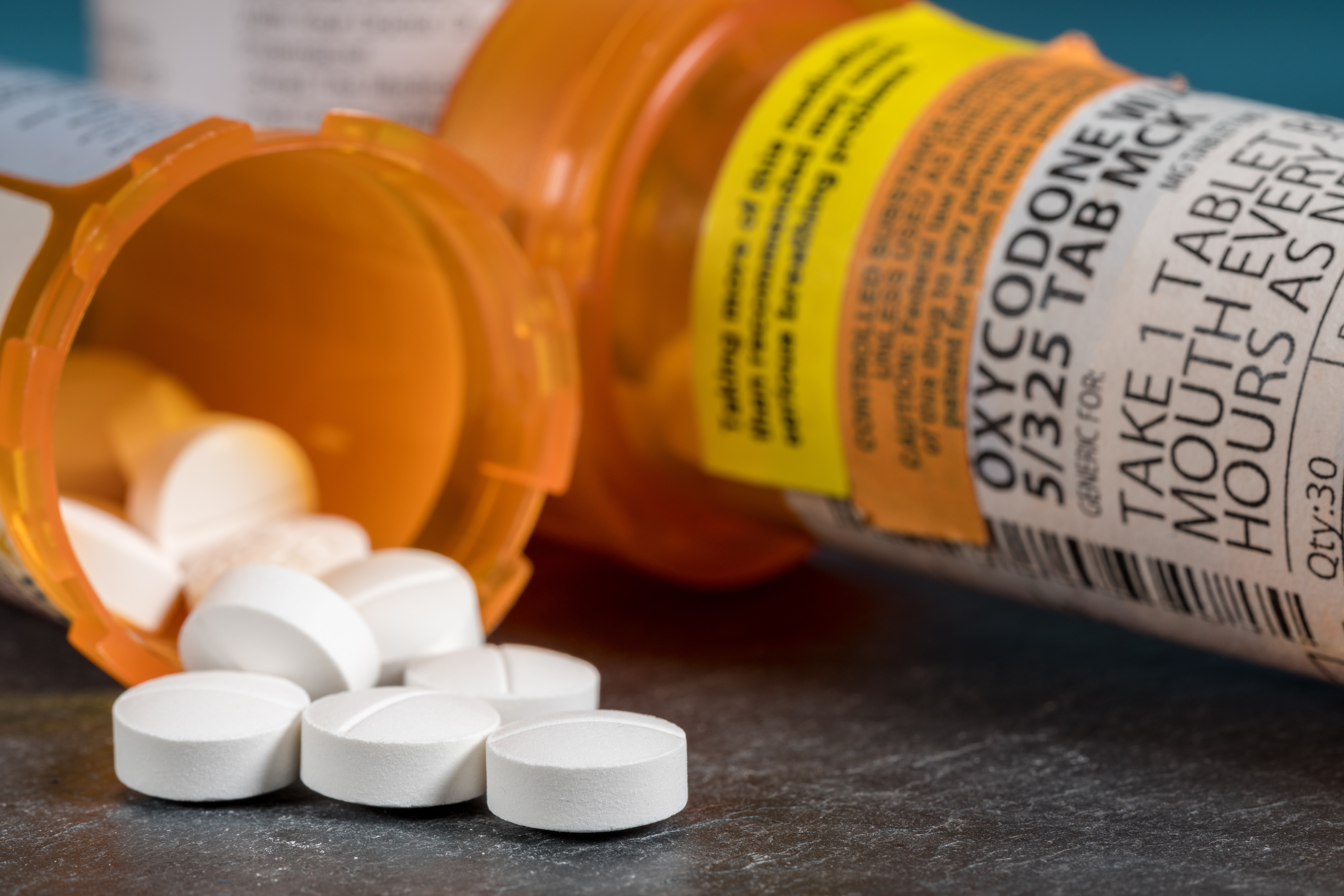 Oxycodone is the generic name for a range of opoid pain killing tablets. Prescription bottle for Oxycodone tablets and pills