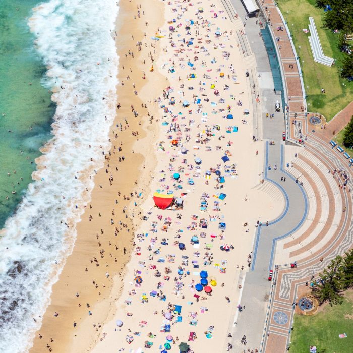 Wide angle view of Coogee Beach along Sydney Eastern Beaches in summer.