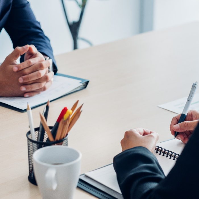 Close up interviewer interview candidate apply for job at meeting room in office