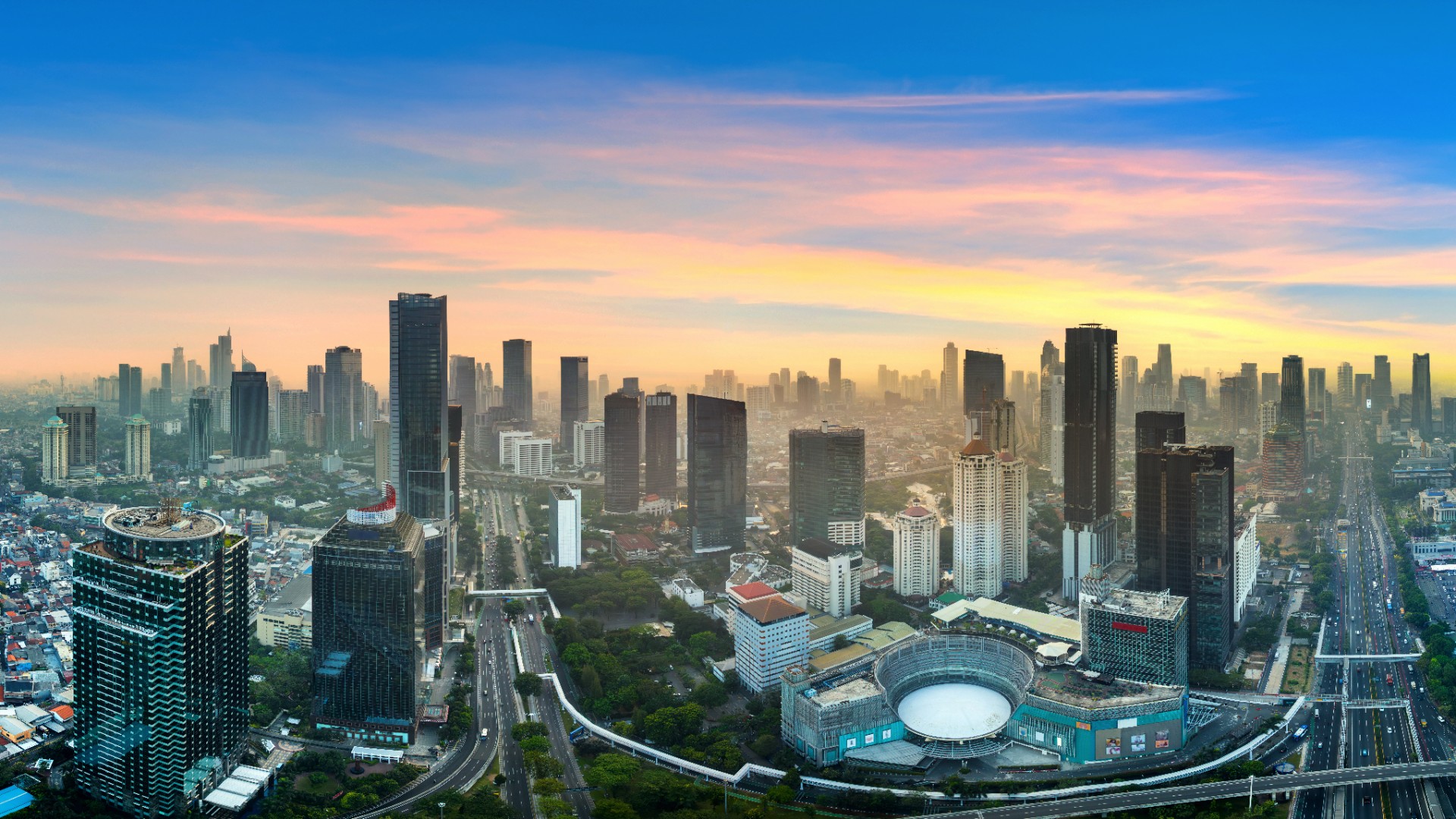 Panorama of Jakarta city at sunrise, Indonesia.