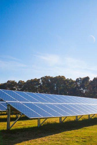View of solar panels under blue sky