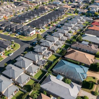 Aerial view of rows of mass produced 'cookie cutter' style homes build during the 2010s in outer suburban Sydney, Australia.