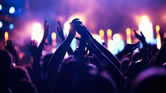 Crowd cheering at a concert music festival