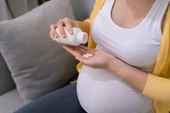 Pregnant woman taking medication