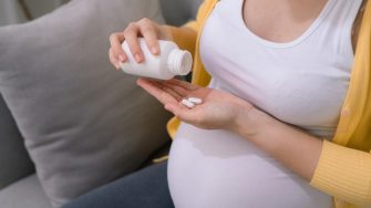 Pregnant woman taking medication