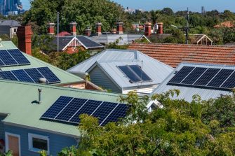 Solar panels on suburban house roofs in Melbourne, Australia
