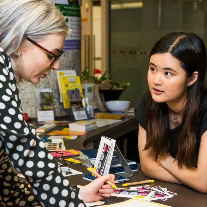 Students being interviewed or spoken to