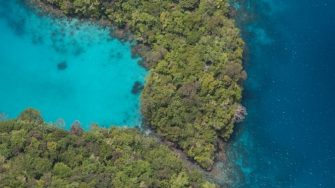 Palau Rock Islands from above - tropical beach with now way to get up on the island