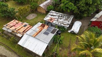 Homes on Pentecost Island, Vanuatu, fitted with multiple rooftop solar panels.