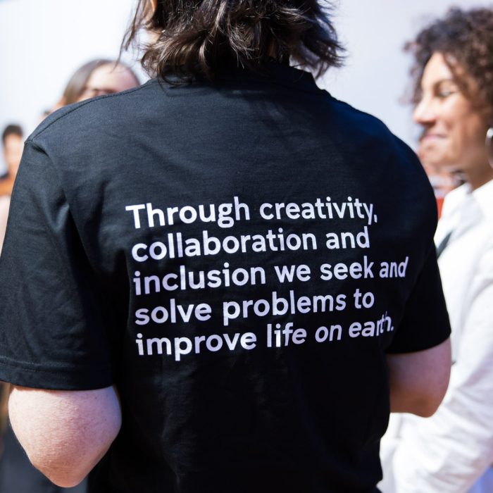 A person wearing a t-shirt with the ADA vision at the Massive Action Sydney Unconvention 