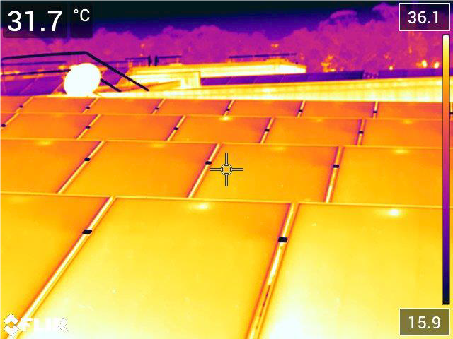 Comparison of thermal and visible images of PV panels