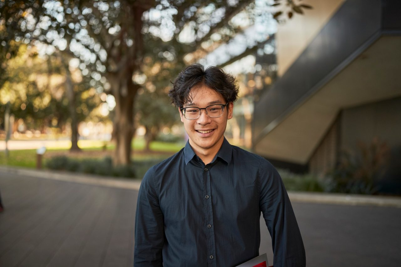 Law student portrait outside, in front of Law Building