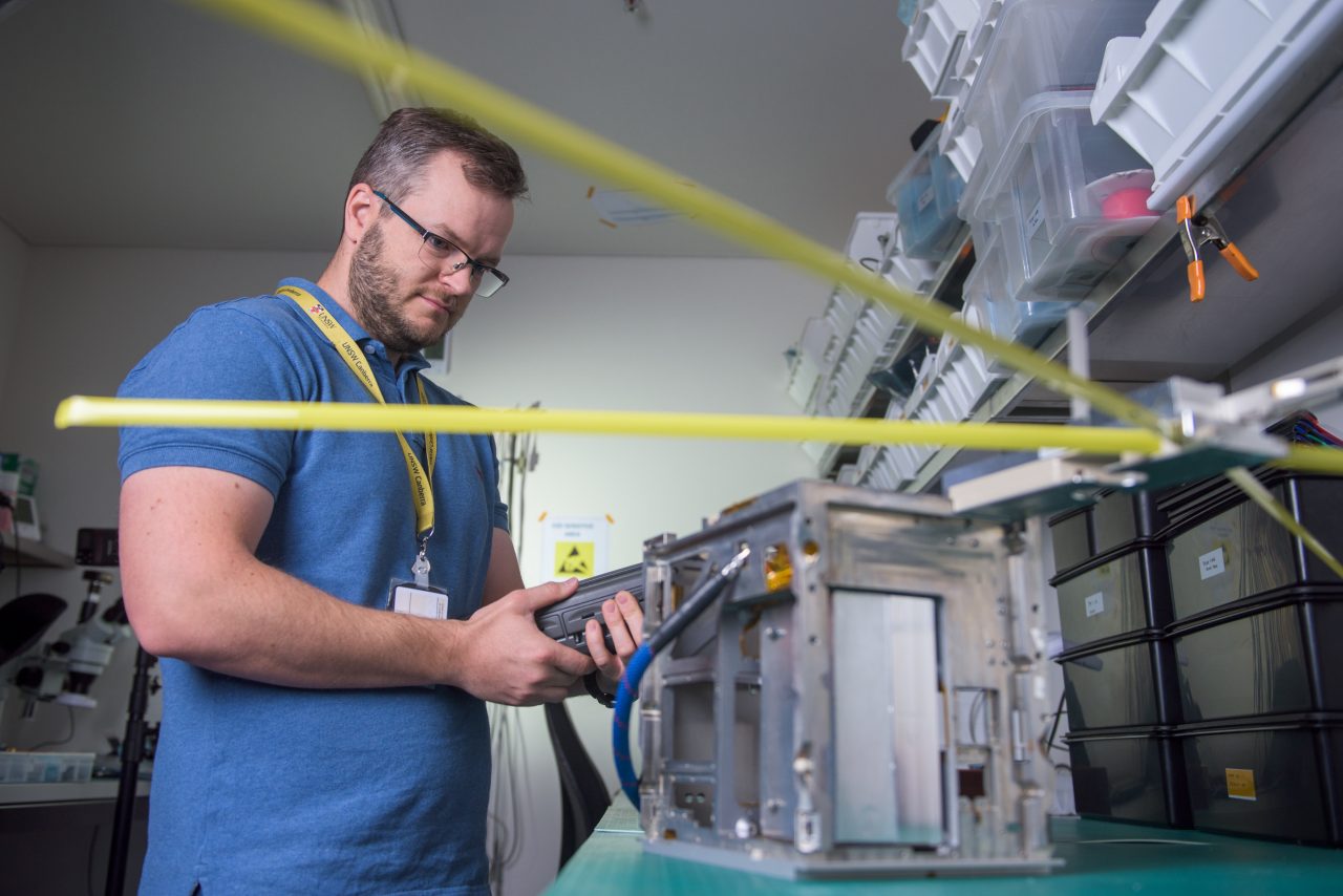 Electronics Engineer Tyson Bollen test RF technology as part of the UNSW Canberra Space M2 satellite project.