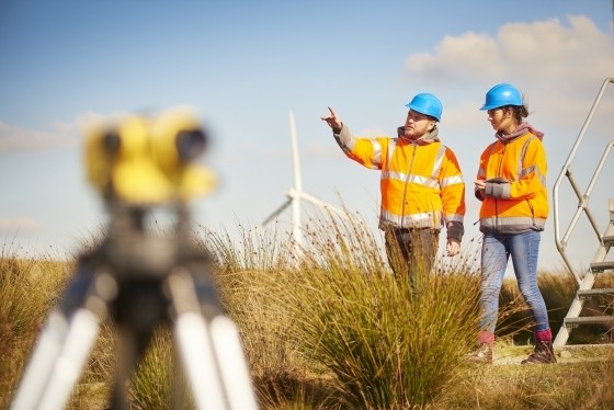 Male and female windfarm engineers