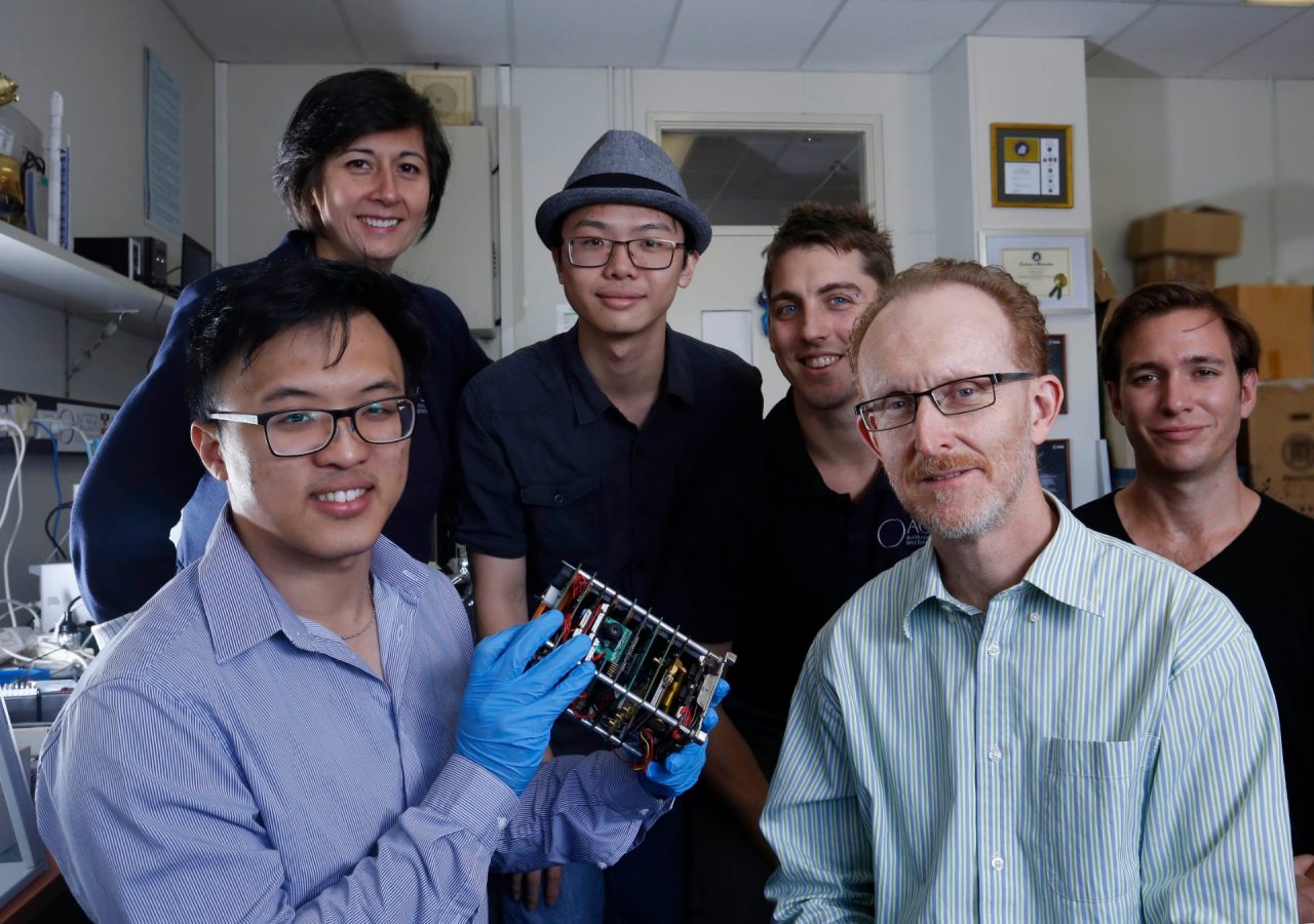 Andrew Dempster with team