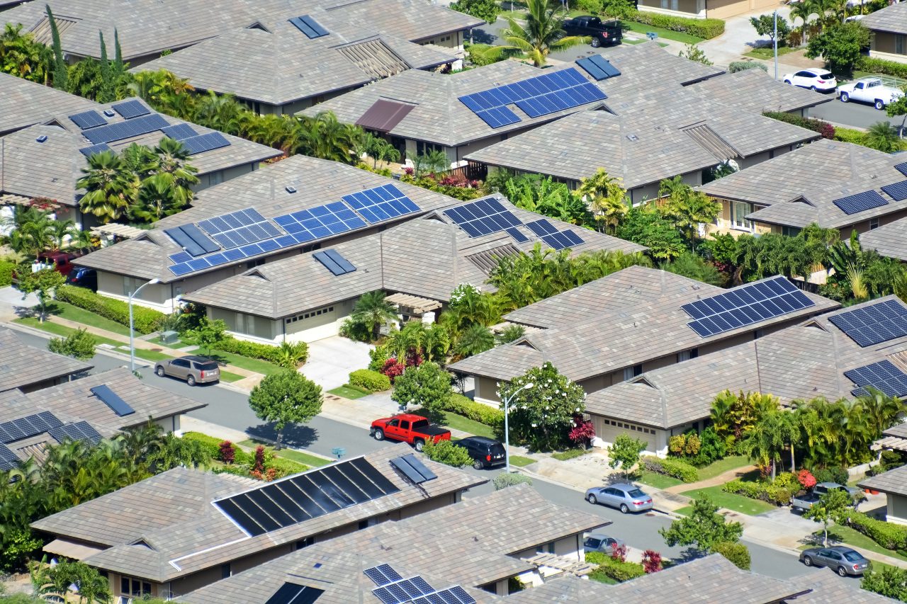 aerial view of houses with solar power