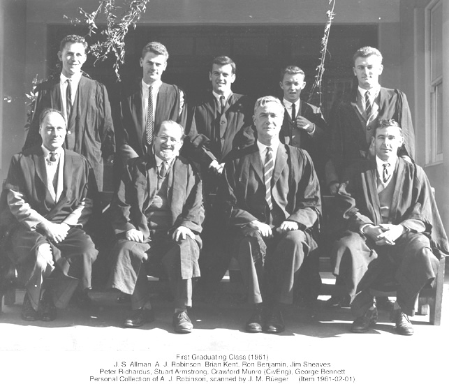 Shows photo of 9 graduating men dressed in suits from 1951