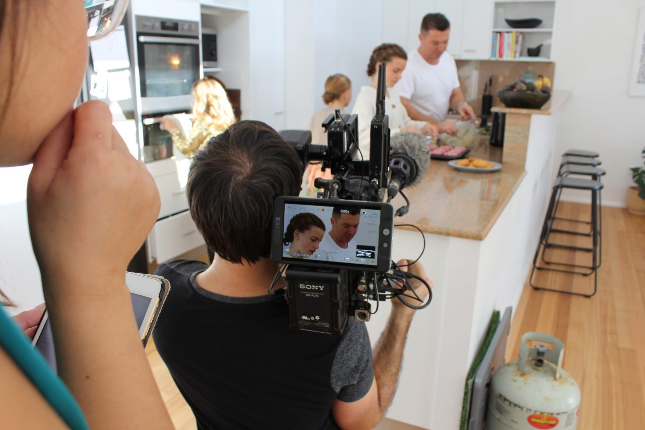 Ben Hutt filming in kitchen
