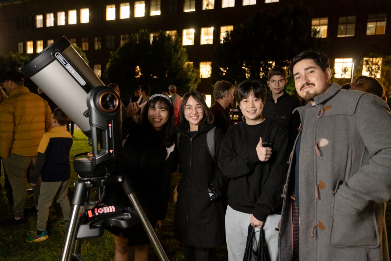 A photo from the Earth Conservation x Space Exploration event with telescopes on the physics lawn