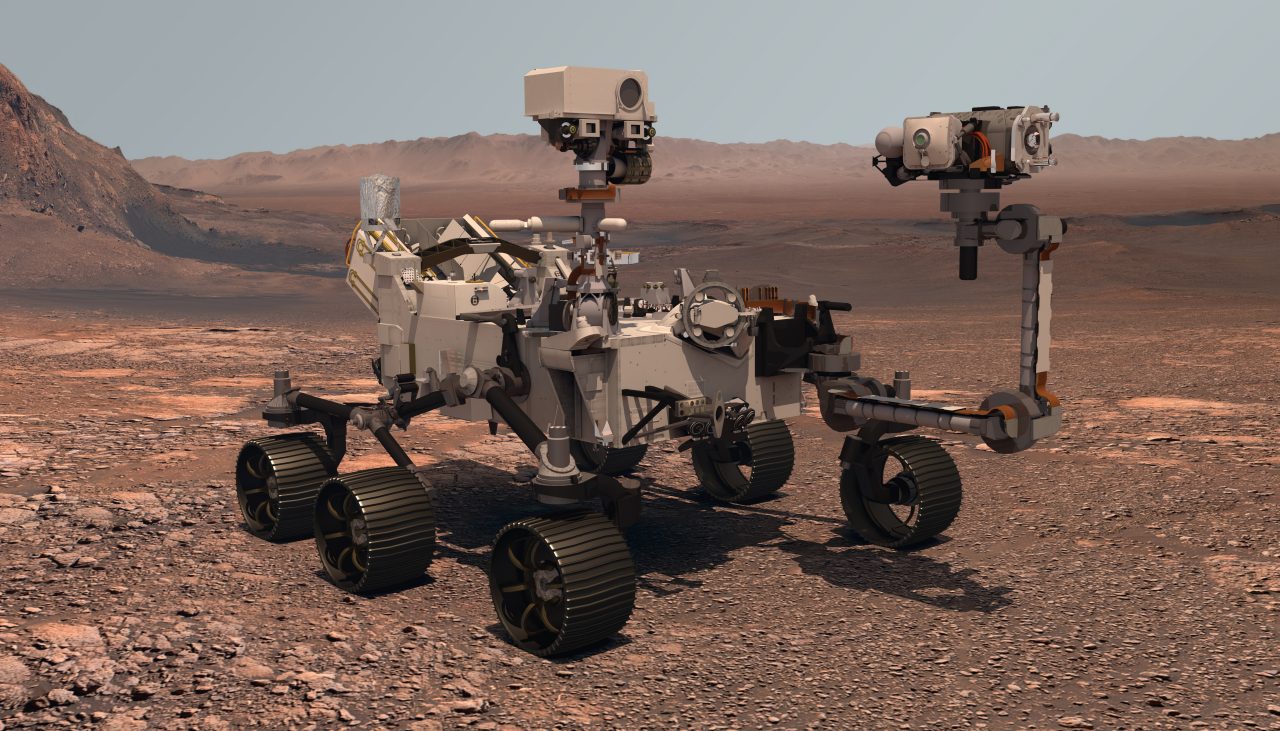 The Perseverance rover deploys its equipment against the backdrop of a true Martian landscape.