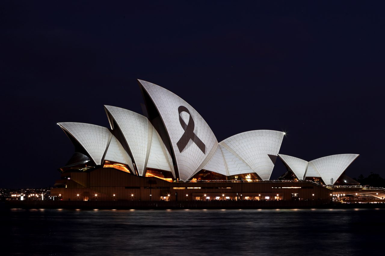 SYDNEY, AUSTRALIA - APRIL 15: The Sydney Opera House is illuminated with a black ribbon in honour of the Bondi Junction victims on April 15, 2024 in Sydney, Australia. Six victims, plus the offender, who was shot by police at the scene, are dead following a stabbing attack at Westfield Shopping Centre Bondi Junction in Sydney on April 13, 2024. (Photo by Brendon Thorne/Getty Images)