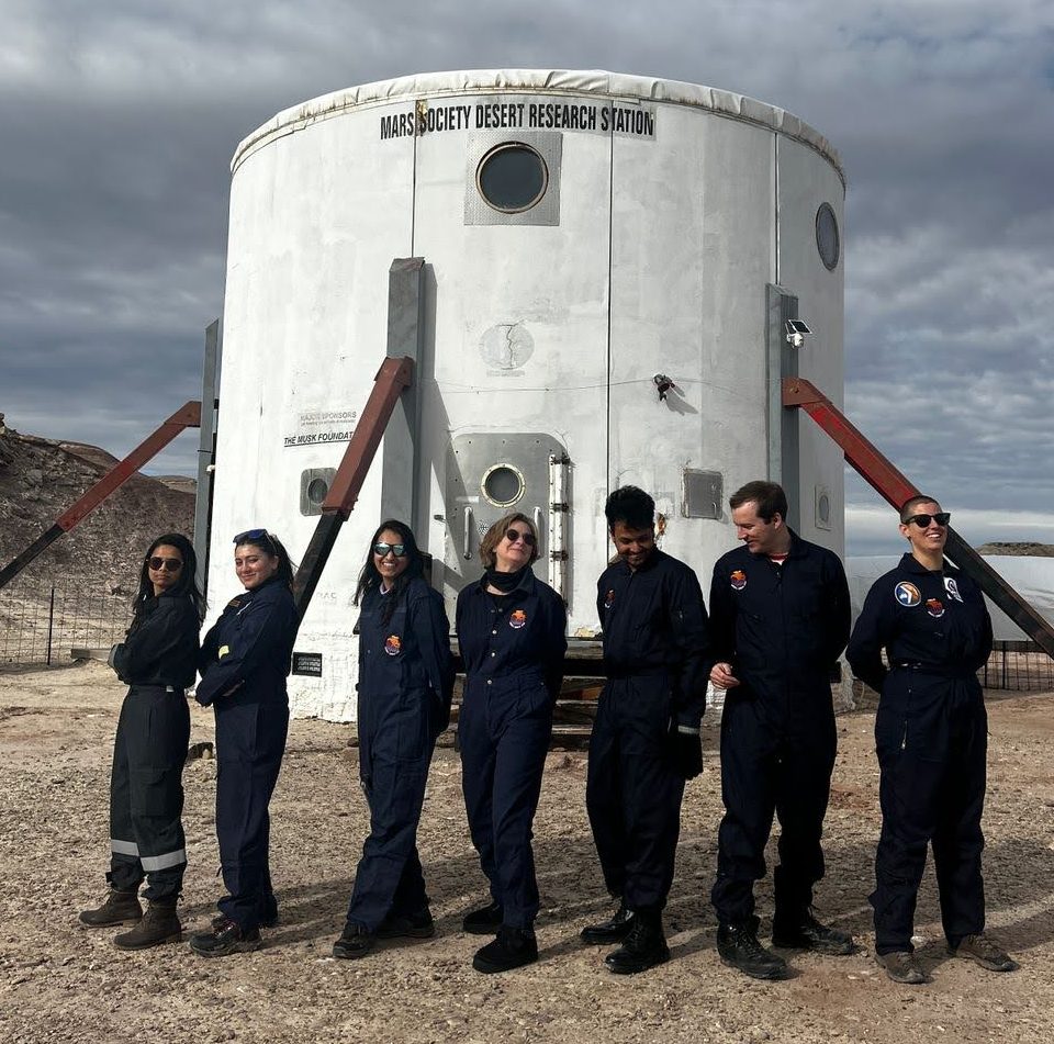 The research crew outside the habitat at the Mars Desert Research Station