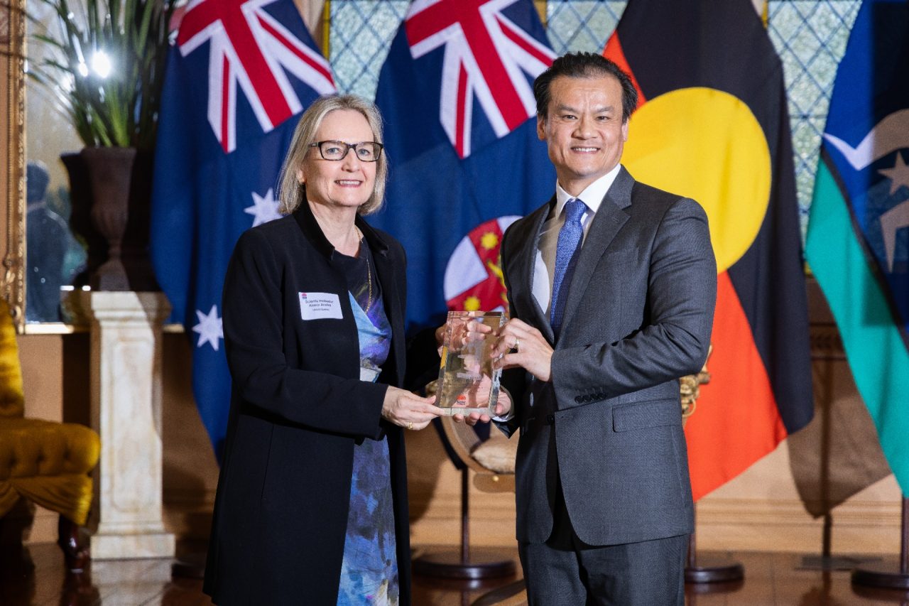 Kaarin receiving an award from a NSW MP.