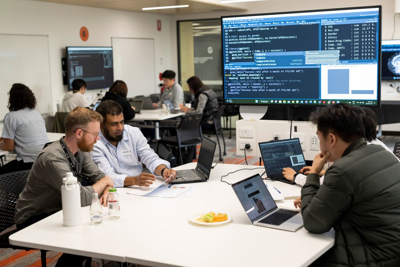 Photo of team working together at UNSW Datathon