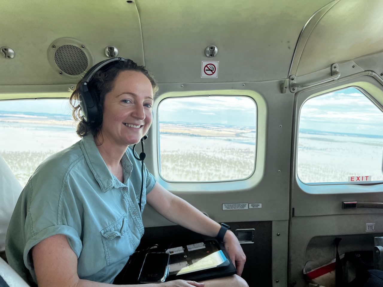 Jody O'Connor in light aircraft surveying waterbirds