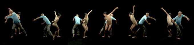 Mosaic of a video still, two figures in a tableau-style pose, shown from six points of view simultaneously.