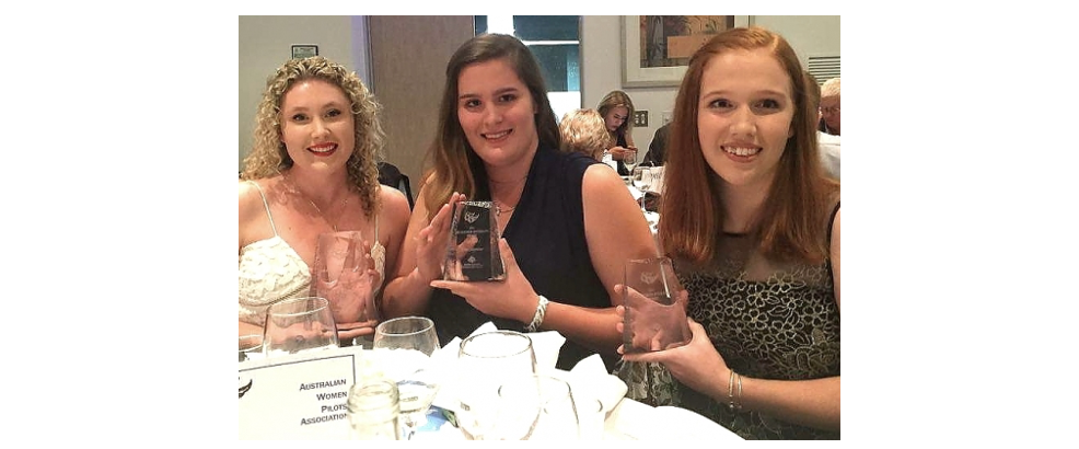 (L) to (R) Hayley Umbers, Katie Seymour and Renee Close receive their awards                                                                          at the Australian Women Pilots Association dinner.