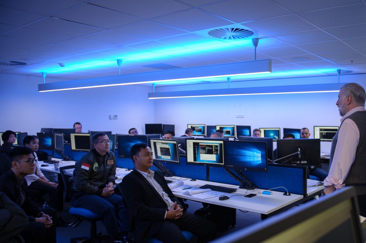 Roger Smith presenting Cyber Security Workshop to an internantional contingent visiting UNSW Canberra Cyber.