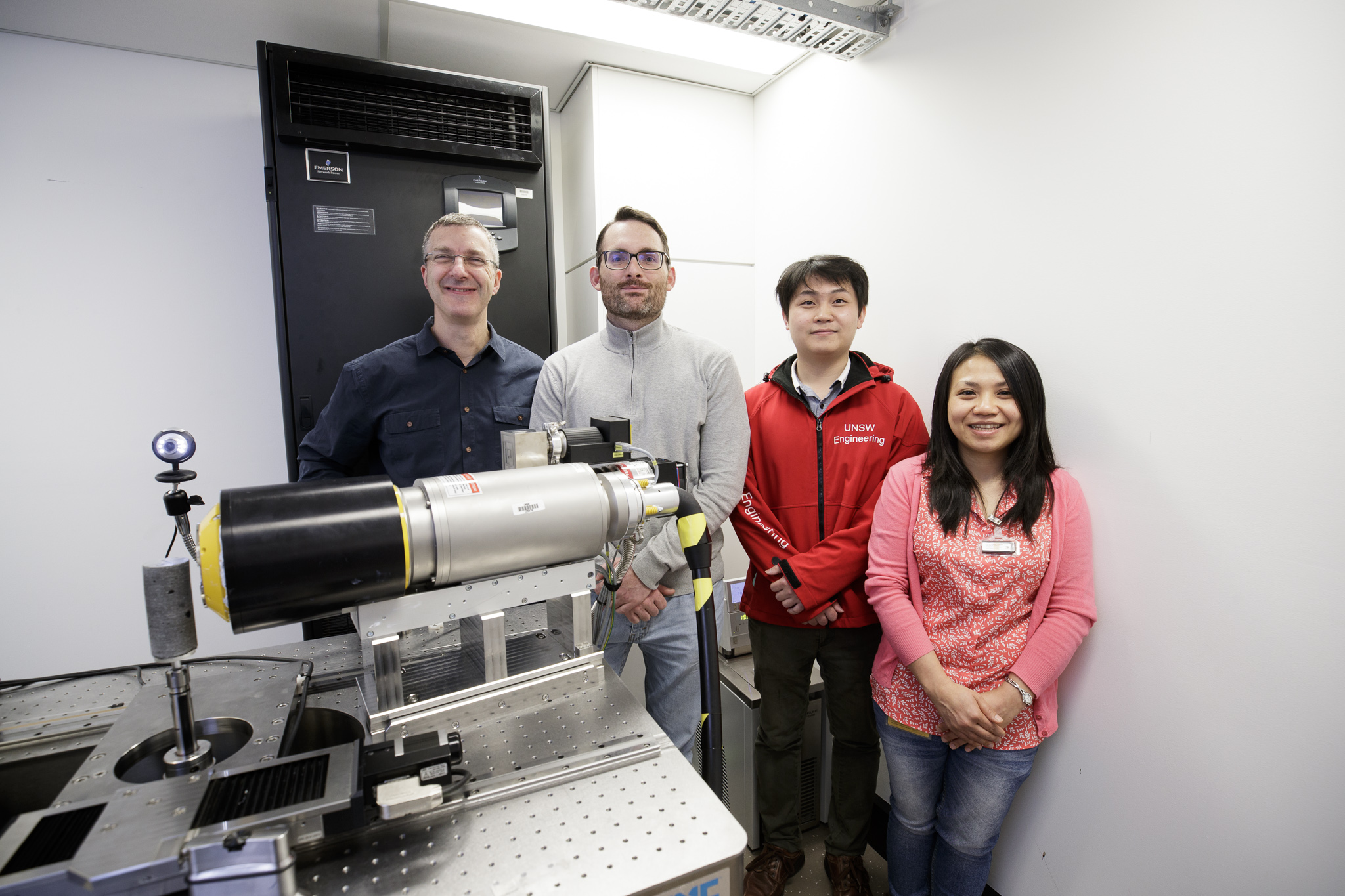 Ryan (second from left) is pictured with colleagues from the school and the micro-CT.